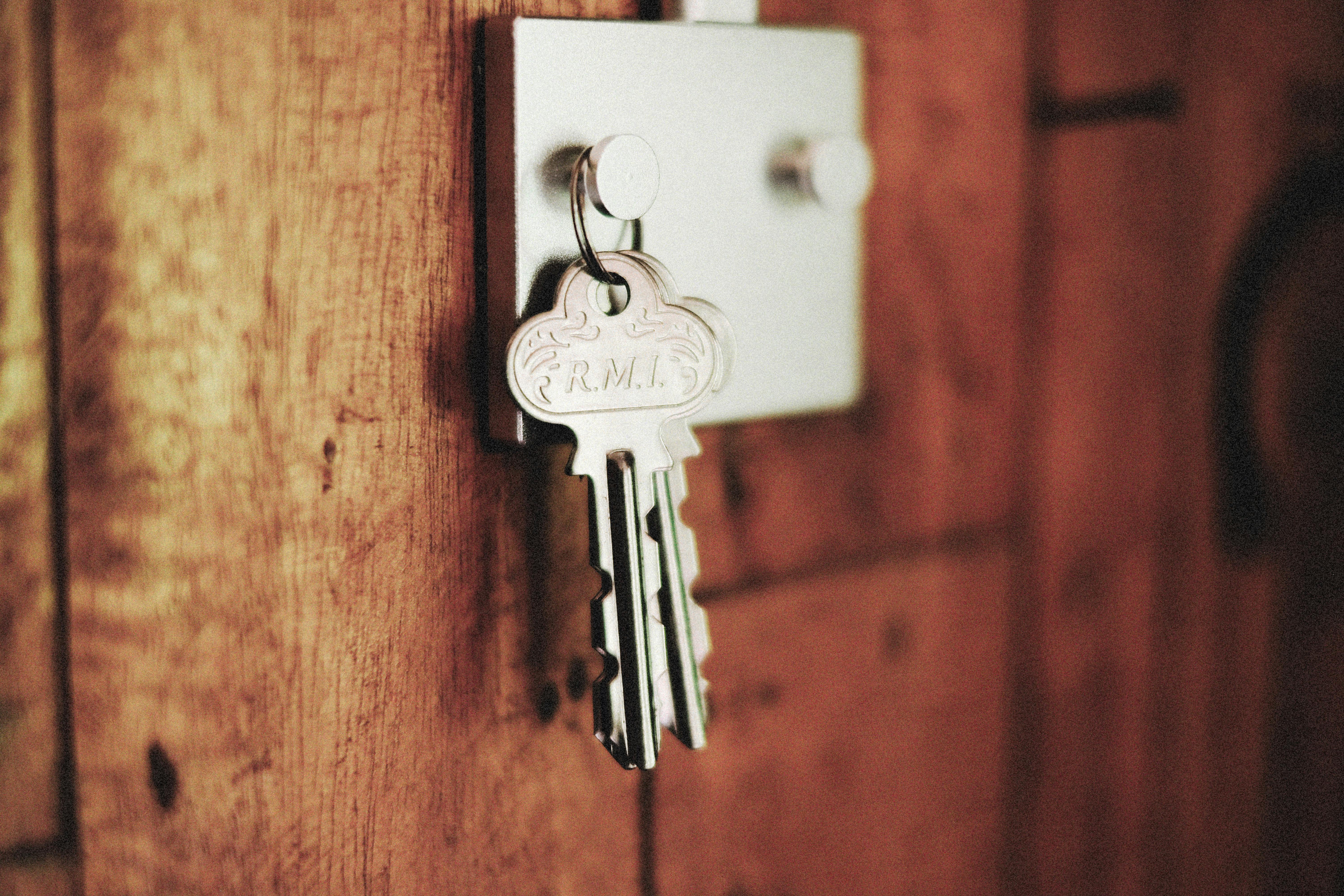 House keys hanging from residential door lock